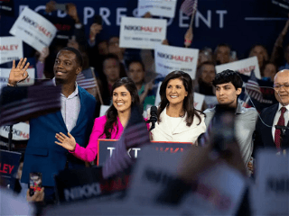 Defeat to Donald Trump looms over Nikki Haley. So why stay in the race?