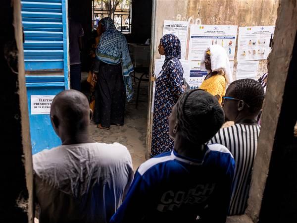 Senegal votes in a tightly contested presidential race after months of unrest