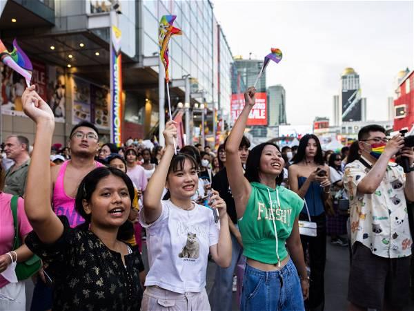 Lawmakers in Thailand overwhelmingly approve a bill to legalize same-sex marriage