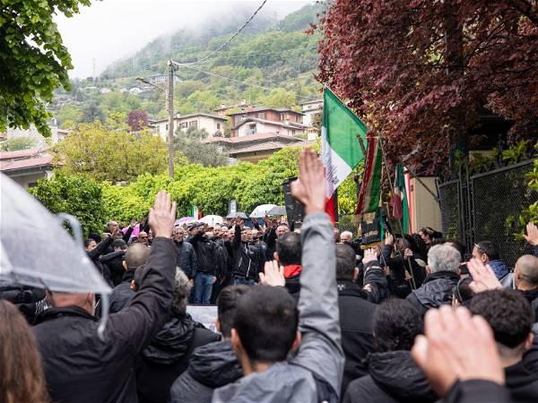 Dozens in Italy give a fascist salute on the anniversary of Mussolini's execution