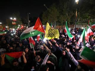 Thousands gather in Iran in show of support for attack on Israel