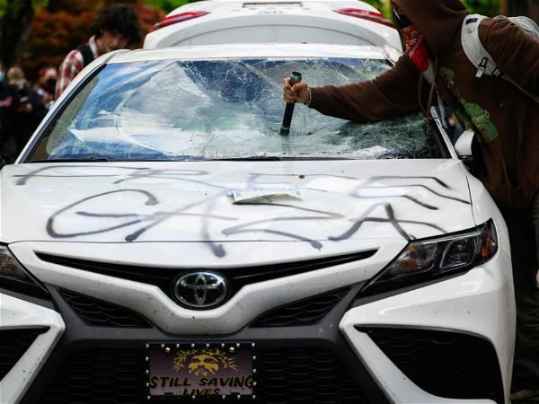 Police detain driver who accelerated toward protesters at Portland State University in Oregon