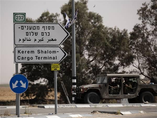 Israel says it reopened a key Gaza crossing after a rocket attack but the UN says no aid has entered